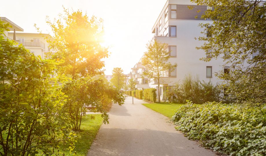 Modern residential buildings with new apartments in a green residential area Modern residential buildings with new apartments in a green residential area