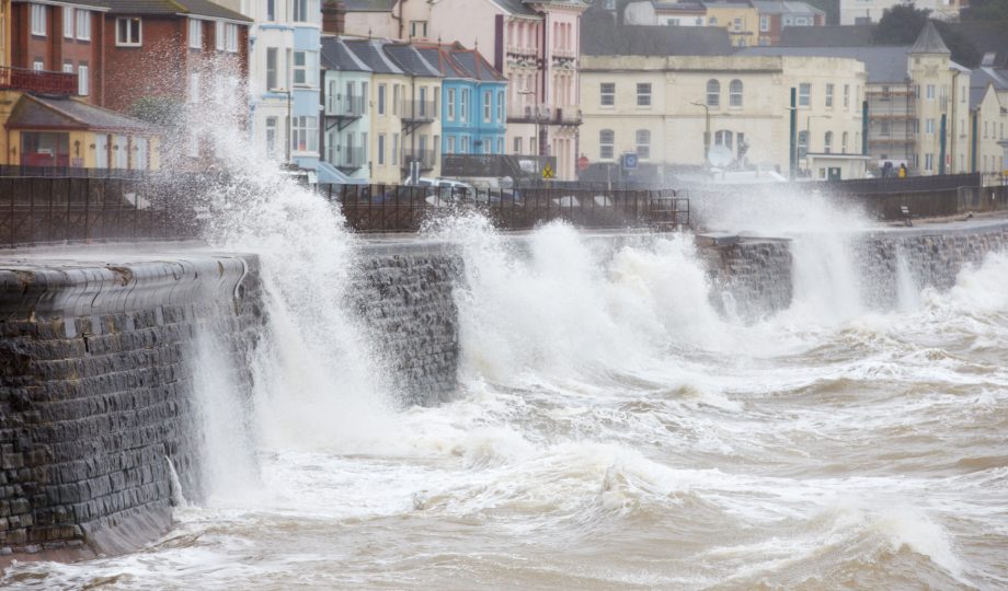 Large waves breaking against the sea wall at Dawlish, Devon Large waves breaking against the sea wall at Dawlish, Devon