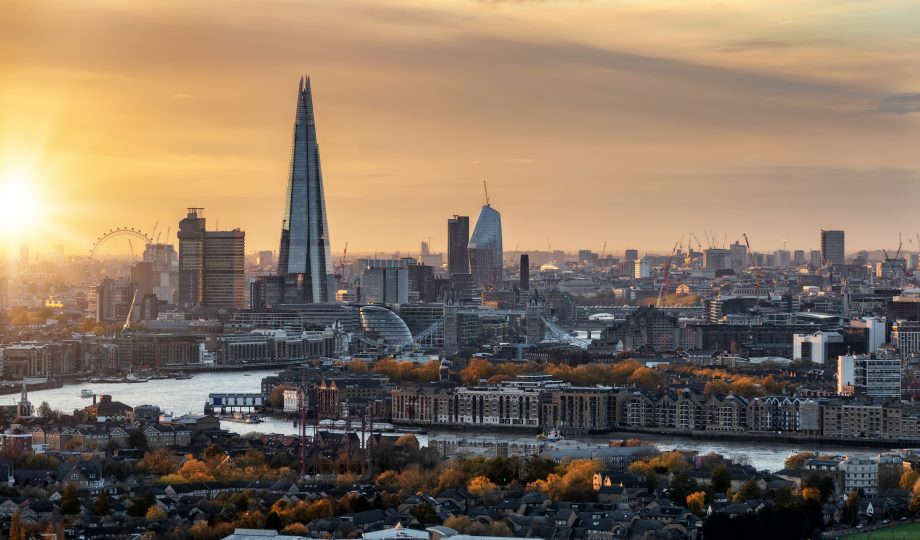 View to the urban skyline of London in autumn during sunset time View to the urban skyline of London in autumn during sunset time
