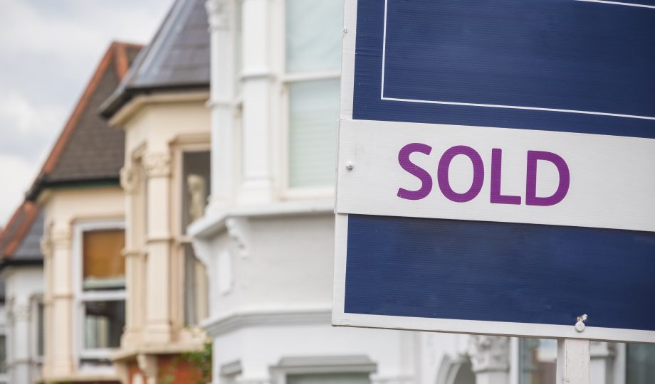 Sold sign displayed outside a terraced house in Harringay Ladder area, London Sold sign displayed outside a terraced house in Harringay Ladder area, London